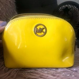 Michael Kors bright yellow makeup bag